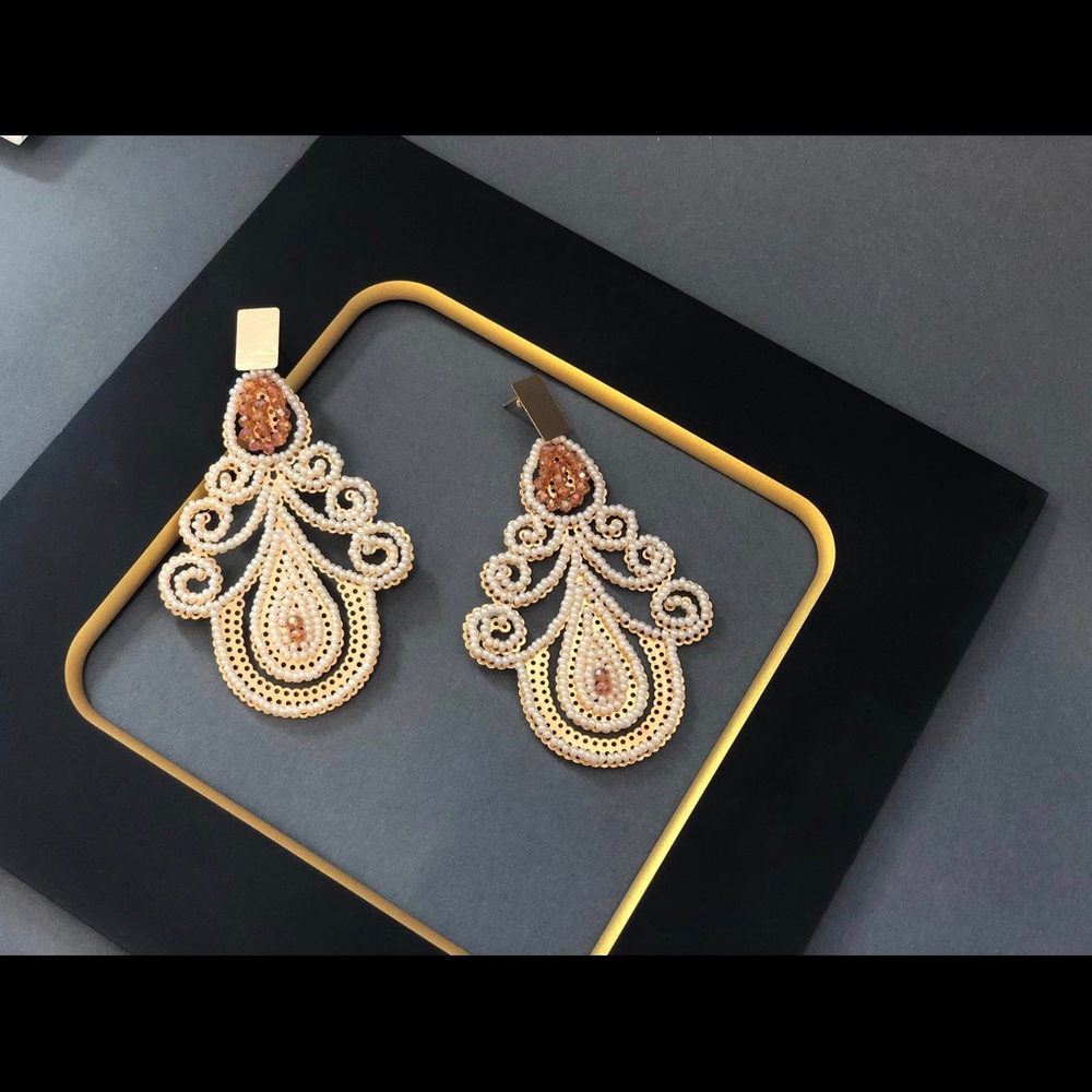 Brand new, hand made earrings, unique design.